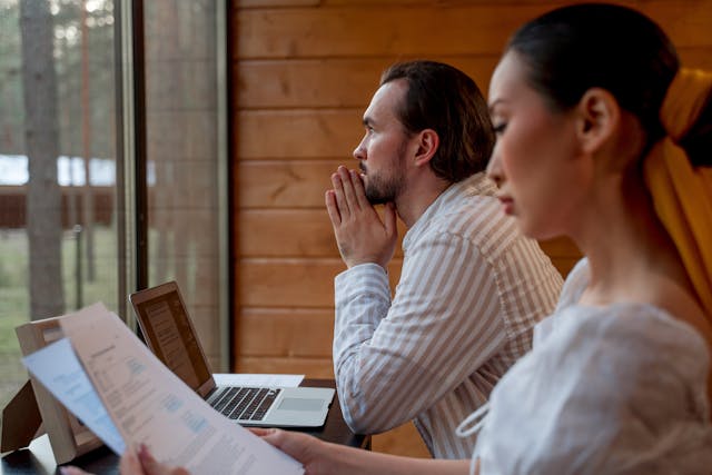 Joe Donti reviewing a retirement plan with clients